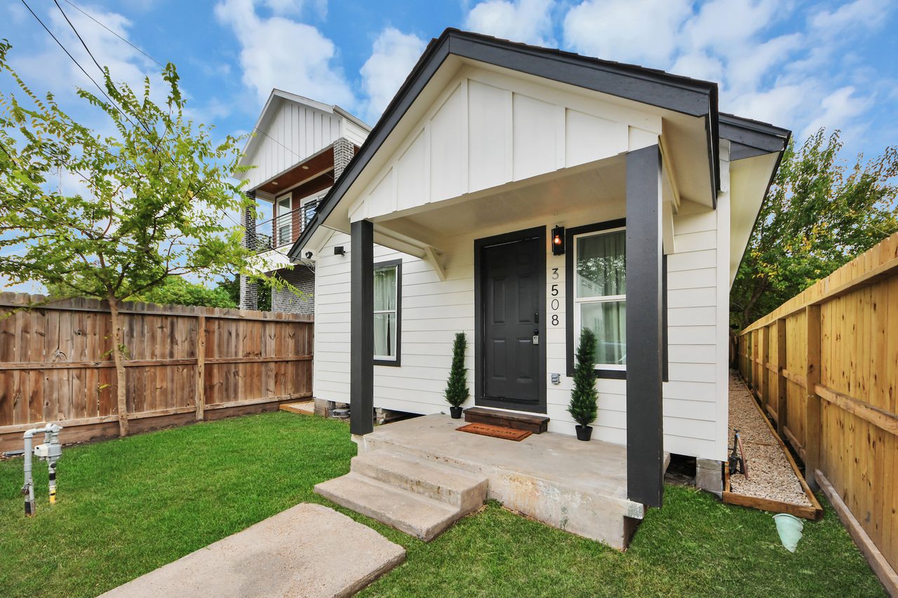 Exterior of 3508 Omega from the side yard